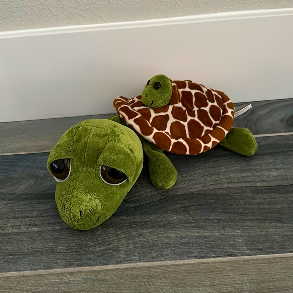Two turtle plushies